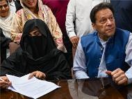 Bushra Bibi with her husband and former Pakistan PM Imran Khan. (Image: AFP File)