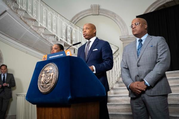 Mayor Eric Adams makes a public safety announcement with NYPD Commissioner Sewell and Deputy Mayor for Public Safety Phillip Banks at City Hall on Monday, April 3, 2023.